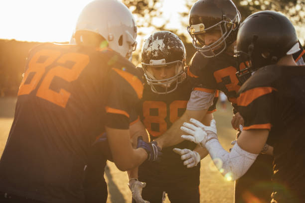 istock American football team unity 1126081755