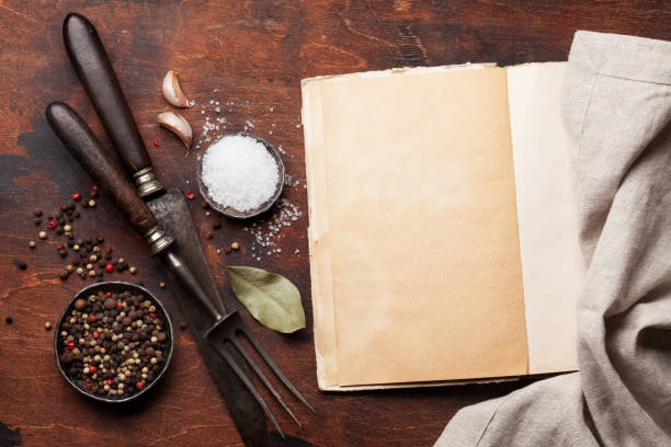 istock Set of various spices and herbs and cookbook 1126083106