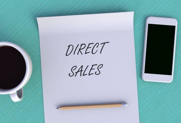 istock DIRECT SALES, message on paper, smart phone and coffee on table, 3D rendering 1126084035