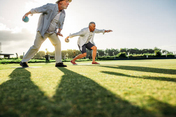 istock Senior men playing boules in a lawn 1126086004