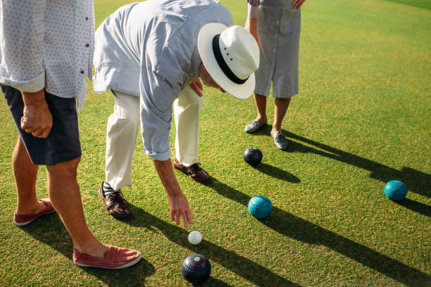 istock Senior people playing boules in a park 1126086350