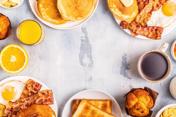 istock Healthy Full American Breakfast with Eggs Bacon Pancakes and Latkes 1126089734