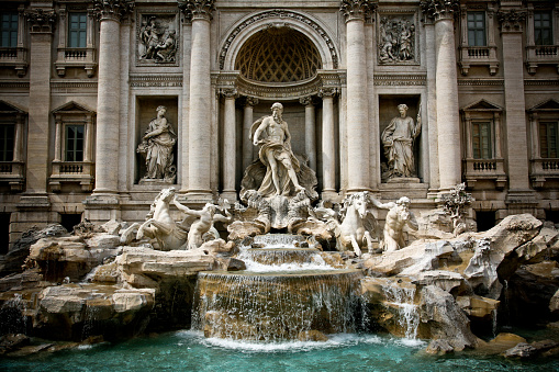 The majestic facade of the Trevi Fountain in the historic and Baroque heart of Rome