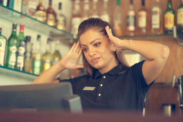 istock The waitress at the cash register 1126091370
