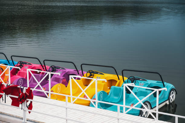 istock Car ride over the lake, entertainment 1126093532