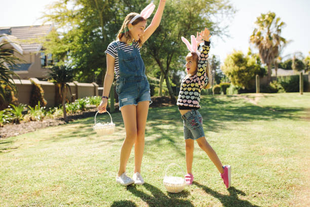 istock Kids playing in a garden on a sunny day 1126094634