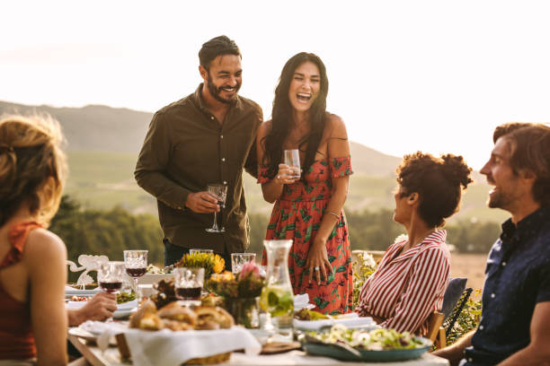 istock Couple at a party making a their marriage announcement 1126095227