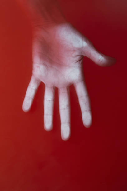 woman palm in red blood water, female hand, cover for art in horror genre, detective novel, concept struggle,creative idea woman palm in red blood water, female hand with fingers apart, cover for art in horror genre, detective novel, concept struggle,creative idea thriller film genre stock pictures, royalty-free photos & images