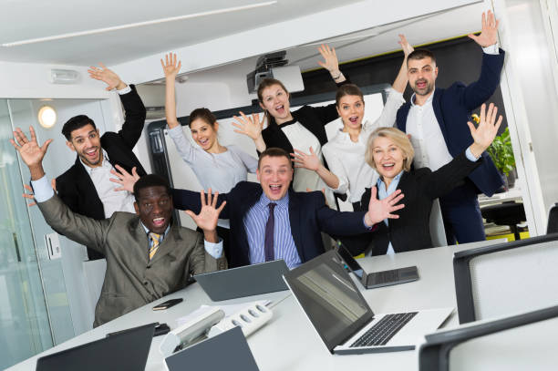 istock business people  rejoice at victory 1126096914