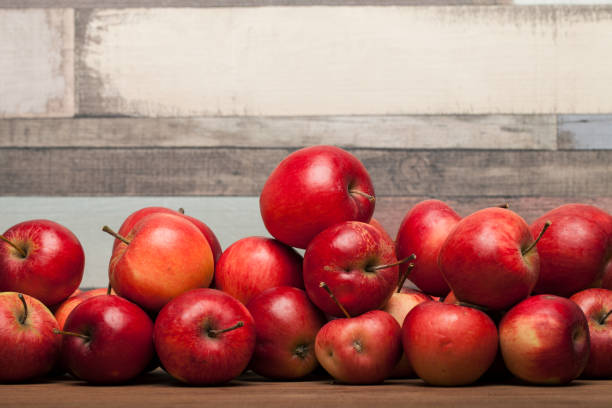 istock Organic apples, apple on wooden table 1126097983