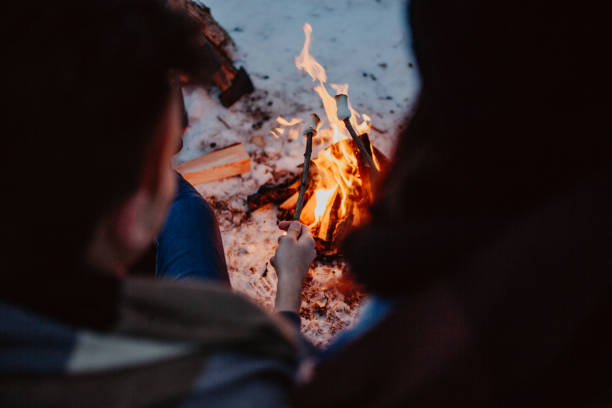 istock Couple camping in winter by the lake 1126103712