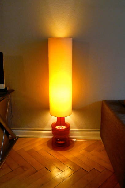 istock Nice lamp from the 70s, with white lampshade and a red glass base 1126110625