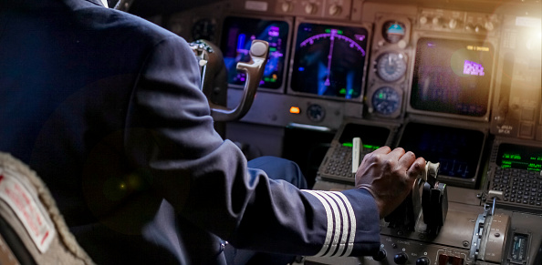 Inside of a fight simulator. View of controllers in cock pit of flight simulator of airplane.