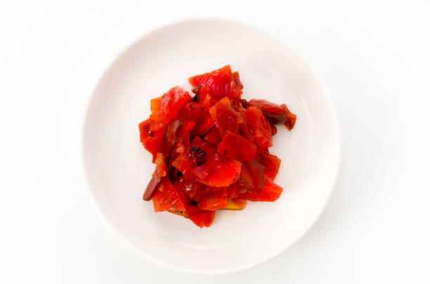 Chili pepper - The Chili pepper plants to the nature of the sphere of the long spikes of pale red, have a spicy and Chili peppers are widely used in many cuisines isolated white background