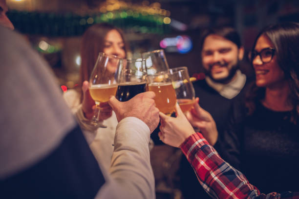 istock Friends drinking beer in pub 1126114781