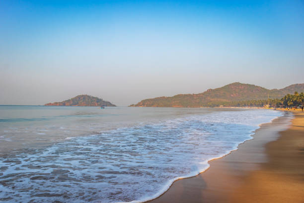 istock Isolated beautiful Palolem beach, Goa in India during sunrise. soft sand with water current waves 1126115456
