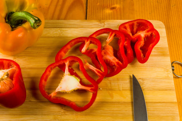 istock sliced fresh red paprika, bell pepper on bamboo cutting board 1126116248