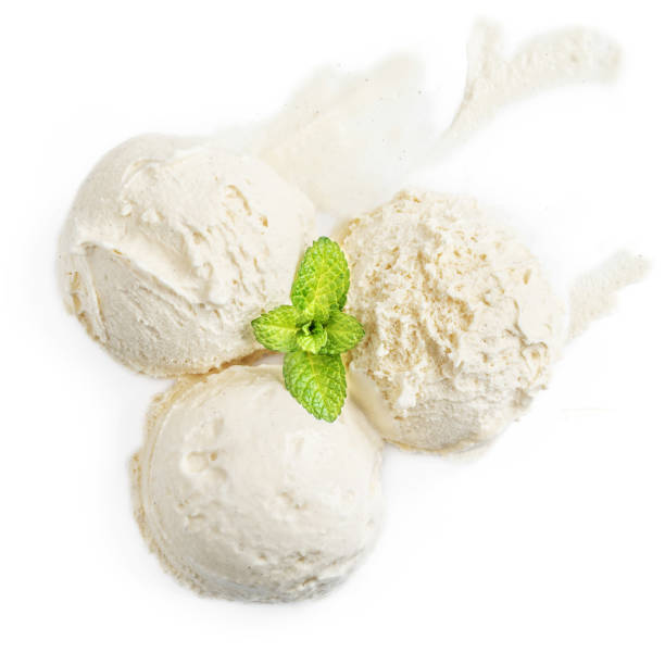 istock Vanilla ice cream ball with fresh mint leaf isolated on white background, macro 1126116408