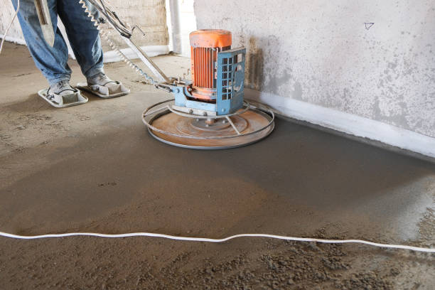 istock the workers grind the concrete floor at the construction site 1126116537