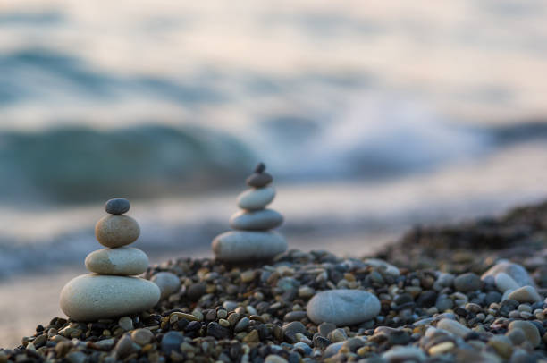 istock stack of zen stones on pebble beach 1126116615
