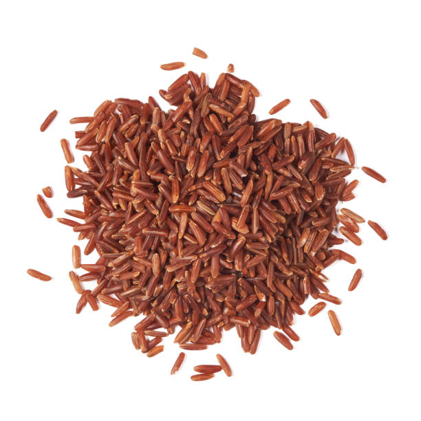 istock Heap of red rice isolated 1126117303