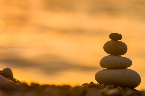 istock stack of zen stones on pebble beach 1126120524