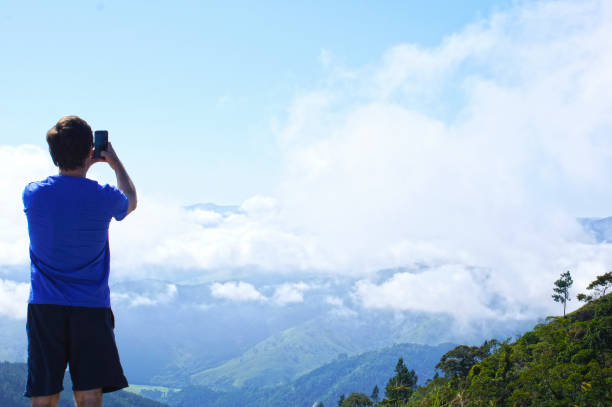 istock Man photographing the mountains 1126120541