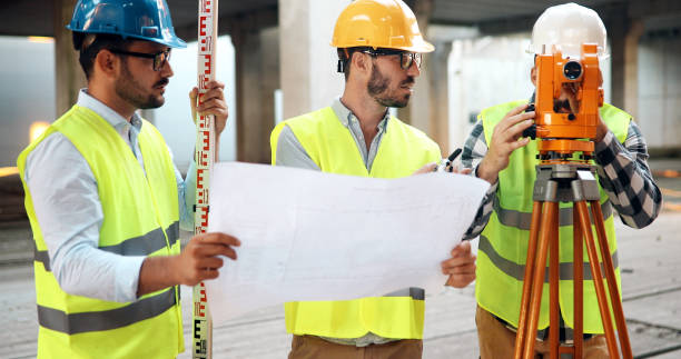 istock Portrait of construction engineers working on building site 1126122032
