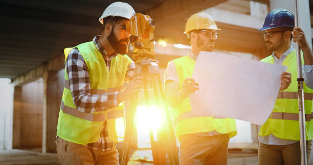 istock Team of architects people in group on construciton site 1126122043