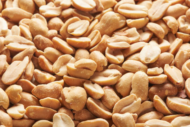 istock heap of roasted and salt peanuts 1126122143