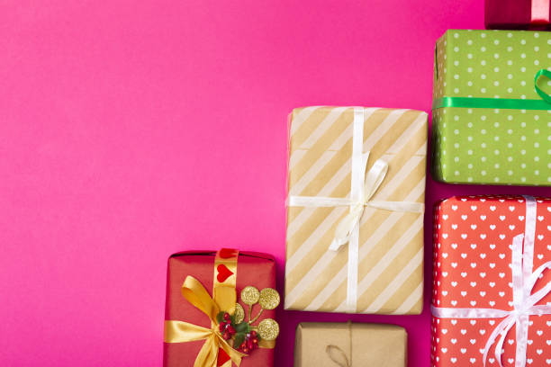 istock background pattern of gift boxes wrapped in decorative paper, top view, holiday concept 1126122857