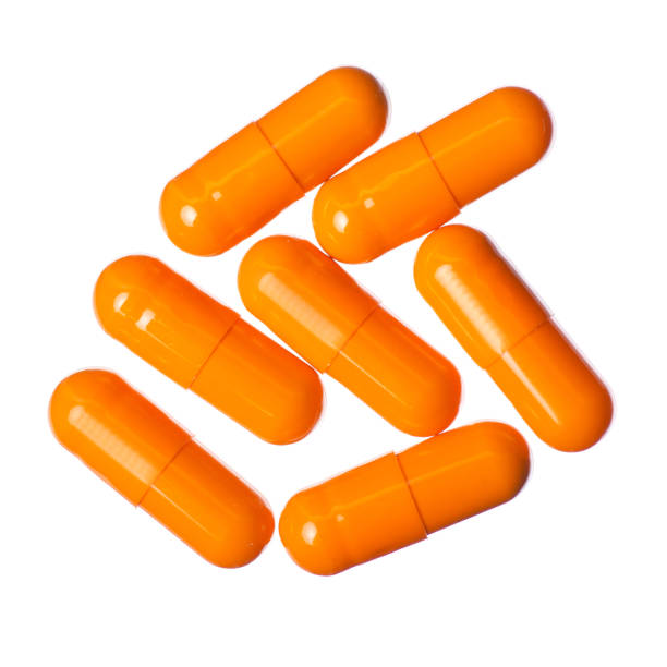 istock Capsule pills medicine pharmacy orange 1126123564