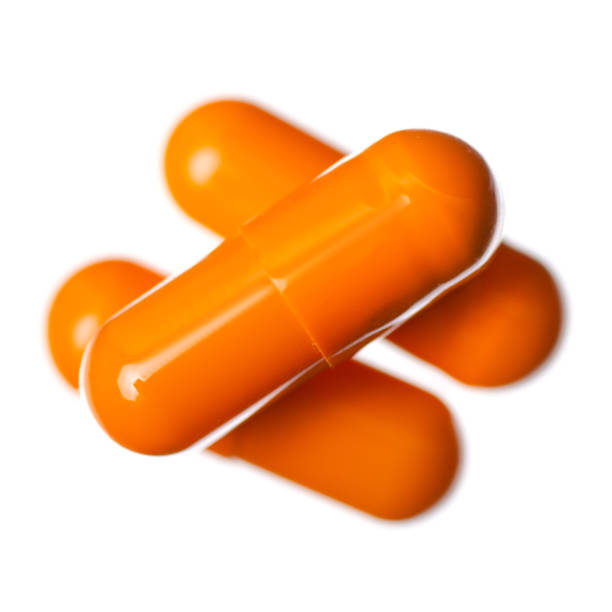 istock Capsule pills medicine pharmacy orange 1126123583