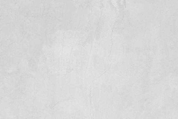 istock White concreted wall for interiors or outdoor exposed surface polished concrete. Cement have sand and stone of tone vintage, natural patterns old antique, design art work floor texture background. 1126125227