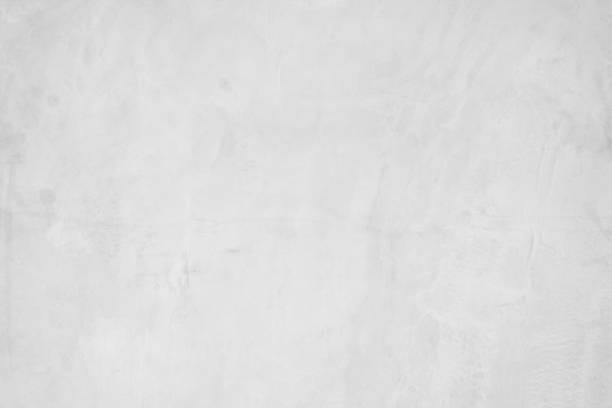 istock White concreted wall for interiors or outdoor exposed surface polished concrete. Cement have sand and stone of tone vintage, natural patterns old antique, design art work floor texture background. 1126125228