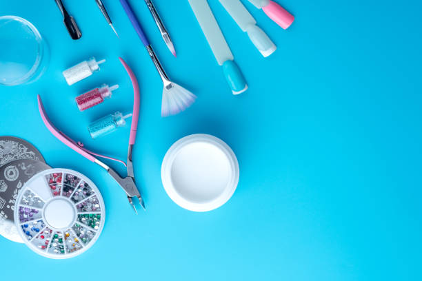 istock Set of cosmetic tools for professional manicure on a blue background. Composition with a place for text 1126125658