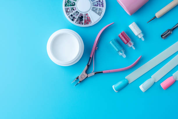 istock Set of cosmetic tools for professional manicure on a blue background. Composition with a place for text 1126125674