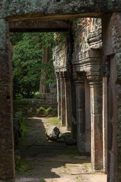 istock Wall of stone temple framed by arch 1126128102