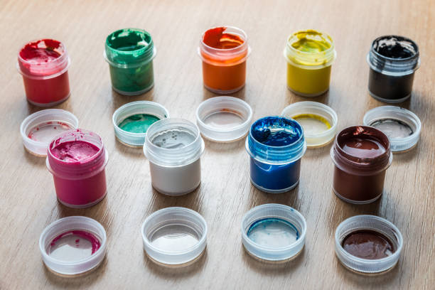 istock small cans of colorful gouache paint on the whole frame 1126131172