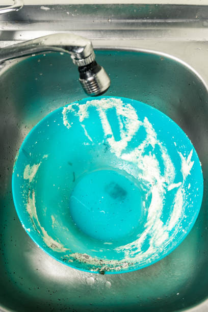 istock dirty dishes, cups, plates, spoons in the sink 1126131857