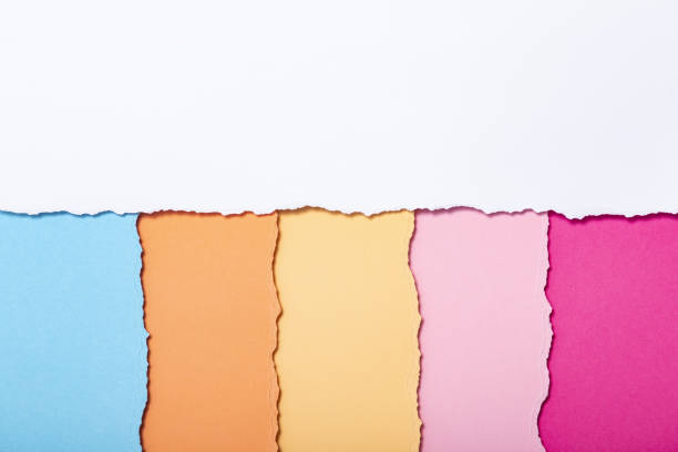 istock abstract background of multi-colored stripes of torn cardboard lying vertically, top view 1126132704