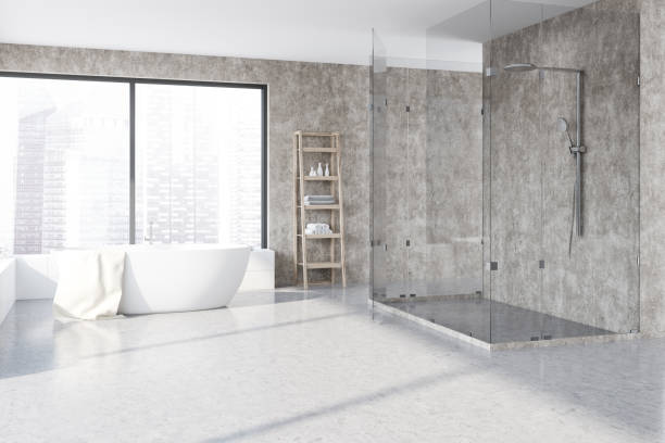 istock Concrete bathroom corner, tub and shower 1126135299