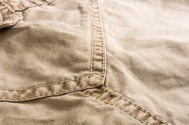 istock clothing items washed cotton fabric texture with seams 1126135835