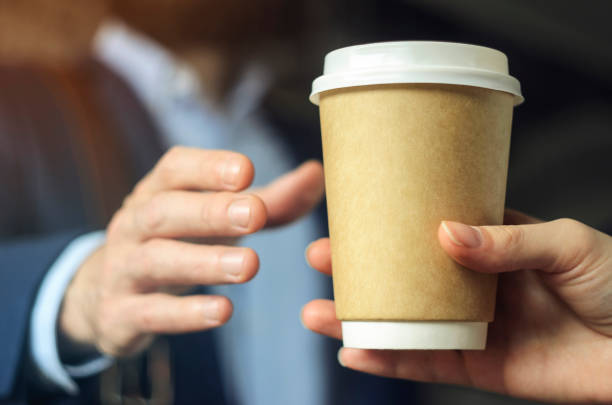 istock Barista serves coffee to a man. Coffee break concept 1126136376