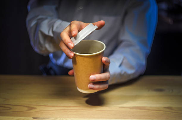 istock Barista serves coffee in a paper cup at the bar 1126136558