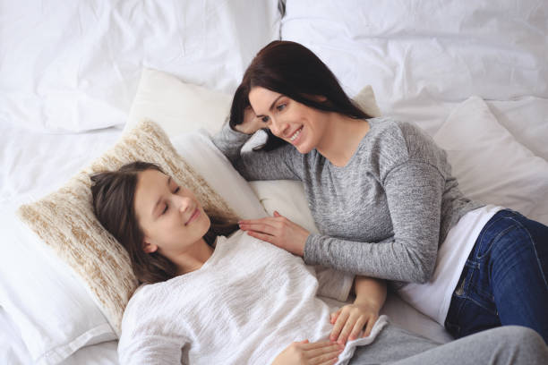 Beautiful mother with teenage daughter stock photo