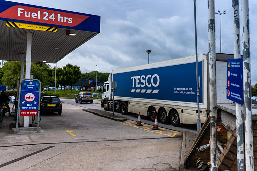 A Tesco lorry heads past the Petrol Station in Stoke on Trent, Staffordshire, logistics