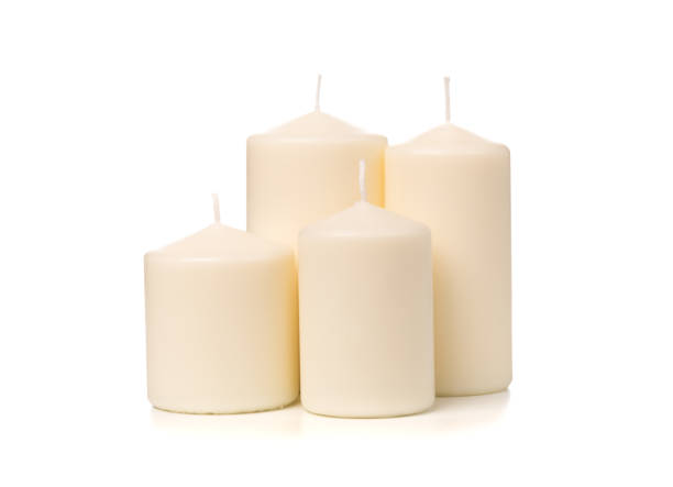 istock White candle on white background isolated. Set of wax candle. 1126143276