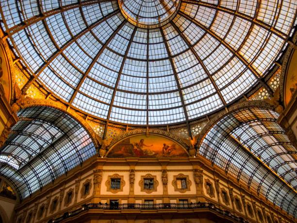 a suggestive view inside the dome of the galleria vittorio emanuele ii in the historic heart of milan - dome milan italy architectural feature italy imagens e fotografias de stock