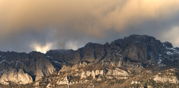 istock Landscape of a rocky mountain with clouds 1126148620